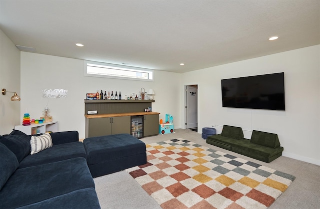 1405 NE Main St, Grimes, IA 50111 - carpeted living room with recessed lighting and a bar
