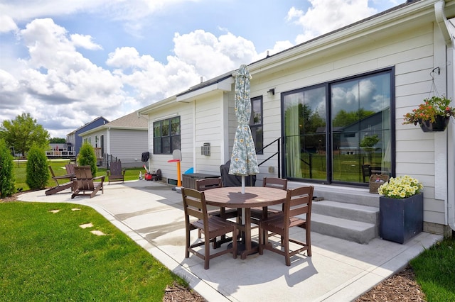 1405 NE Main St, Grimes, IA 50111 - view of patio featuring outdoor dining area