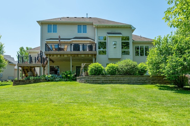 105 Everett Cir, Mingo, IA 50168 - rear view of property featuring a wooden deck, stairs, and a lawn