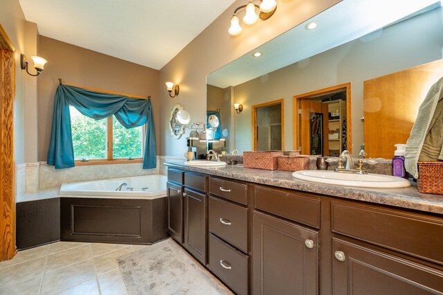 105 Everett Cir, Mingo, IA 50168 - full bathroom featuring double vanity, tile patterned flooring, and a garden tub