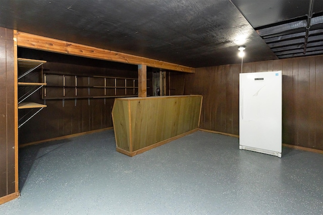 3113 E 36th Ct, Des Moines, IA 50317 - finished basement with wood walls and freestanding refrigerator