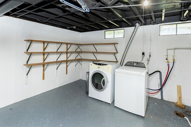 3113 E 36th Ct, Des Moines, IA 50317 - washroom with independent washer and dryer and healthy amount of natural light