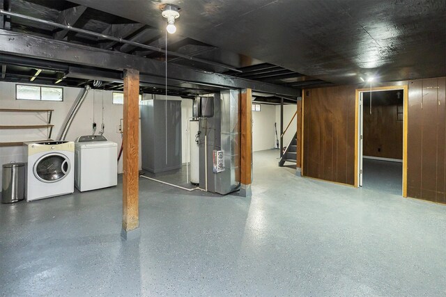 3113 E 36th Ct, Des Moines, IA 50317 - basement with separate washer and dryer, heating unit, and stairway