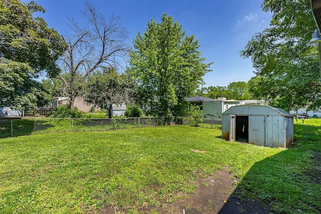 3113 E 36th Ct, Des Moines, IA 50317 - fenced backyard featuring a storage shed