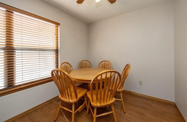 8628 Alpine Dr Unit C, Urbandale, IA 50322 - dining space with wood finished floors, a ceiling fan, and healthy amount of natural light