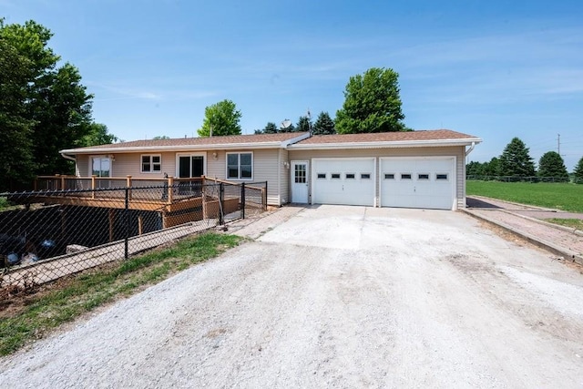 28453 530th Ave, Kelley, IA 50134 - ranch-style home featuring a garage and concrete driveway