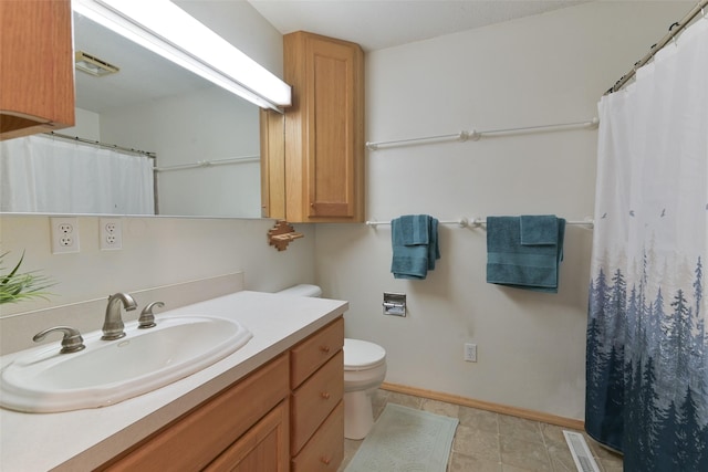 28453 530th Ave, Kelley, IA 50134 - bathroom featuring vanity, a shower with shower curtain, and tile patterned floors
