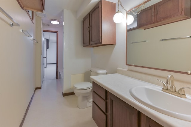 28453 530th Ave, Kelley, IA 50134 - bathroom featuring toilet and vanity
