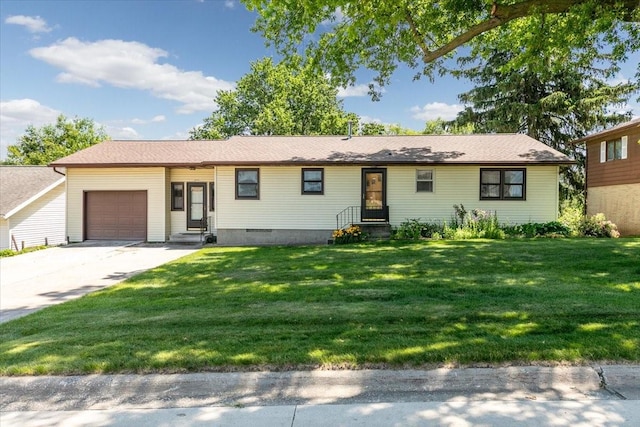 501 N Orchard St N, Brooklyn, IA 52211 - ranch-style house with a garage, a front yard, concrete driveway, and entry steps