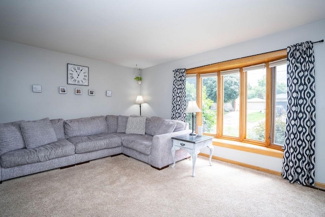 331 E 24th St N, Newton, IA 50208 - carpeted living room with baseboards