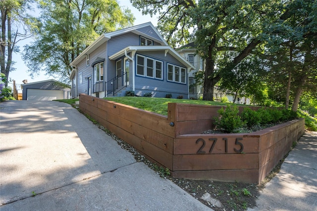 2715 Center St, Des Moines, IA 50312 - bungalow with an outbuilding and a detached garage