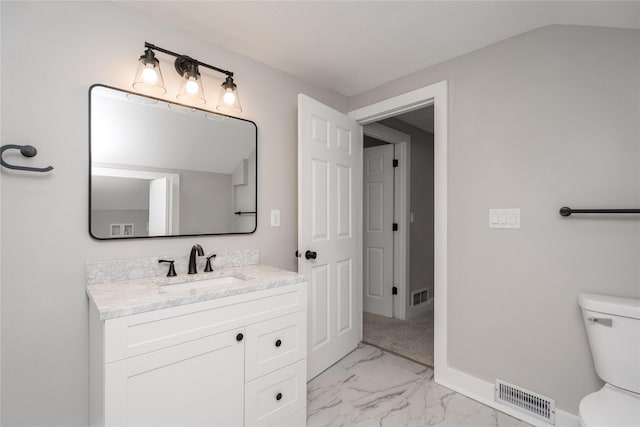 2715 Center St, Des Moines, IA 50312 - bathroom featuring vanity and marble finish floors