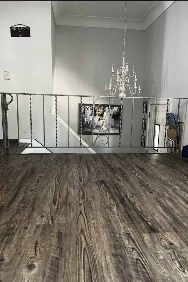 815 Knob Hill Dr, Des Moines, IA 50317 - detailed view of wood finished floors, a chandelier, and ornamental molding