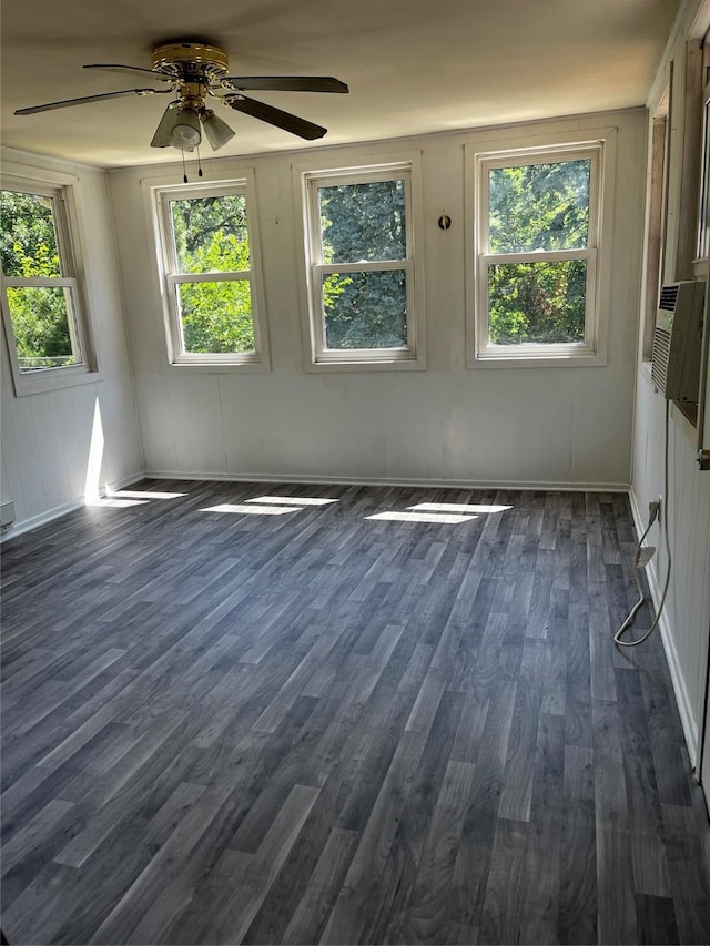 815 Knob Hill Dr, Des Moines, IA 50317 - unfurnished room featuring ceiling fan and dark wood-type flooring