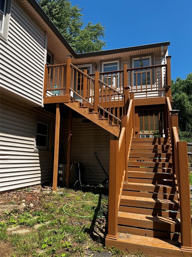 815 Knob Hill Dr, Des Moines, IA 50317 - rear view of house featuring stairs and a wooden deck