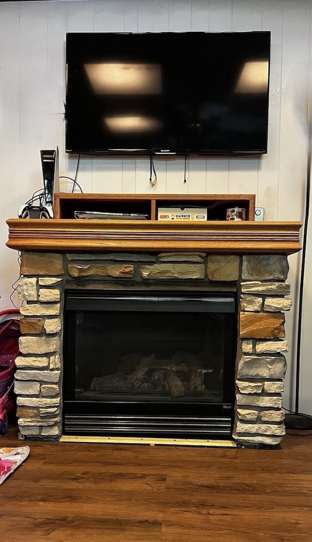 815 Knob Hill Dr, Des Moines, IA 50317 - detailed view of a fireplace and wood finished floors