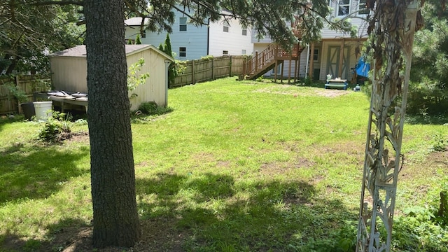 815 Knob Hill Dr, Des Moines, IA 50317 - view of yard with a storage unit and stairs