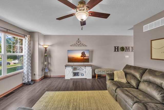 1329 Joshua Cir SE, Bondurant, IA 50035 - living room featuring wood finished floors and ceiling fan