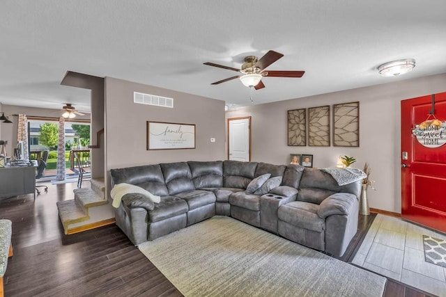 1329 Joshua Cir SE, Bondurant, IA 50035 - living room with a ceiling fan and wood finished floors