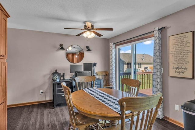 1329 Joshua Cir SE, Bondurant, IA 50035 - dining room featuring a ceiling fan and dark wood-style floors