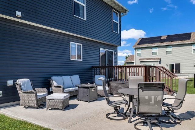 1329 Joshua Cir SE, Bondurant, IA 50035 - view of patio with an outdoor living space with a fire pit and outdoor dining space