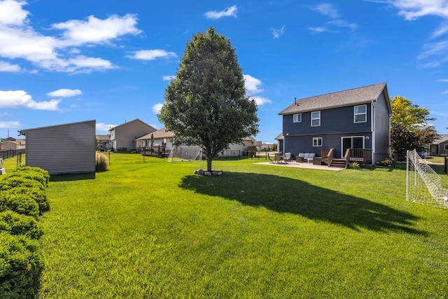 1329 Joshua Cir SE, Bondurant, IA 50035 - view of yard featuring a patio area