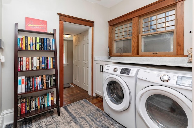 642 Polk Blvd, Des Moines, IA 50312 - washroom with washer and dryer and dark wood-type flooring