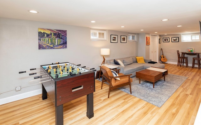 642 Polk Blvd, Des Moines, IA 50312 - recreation room with light wood finished floors and recessed lighting