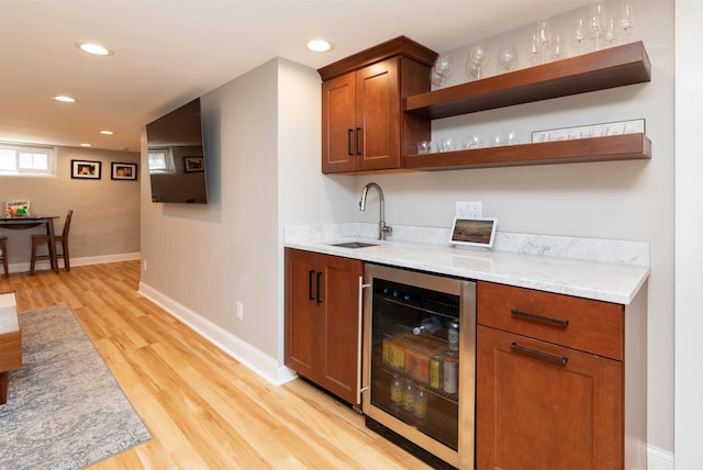 642 Polk Blvd, Des Moines, IA 50312 - indoor wet bar with wine cooler, recessed lighting, and light wood-style floors