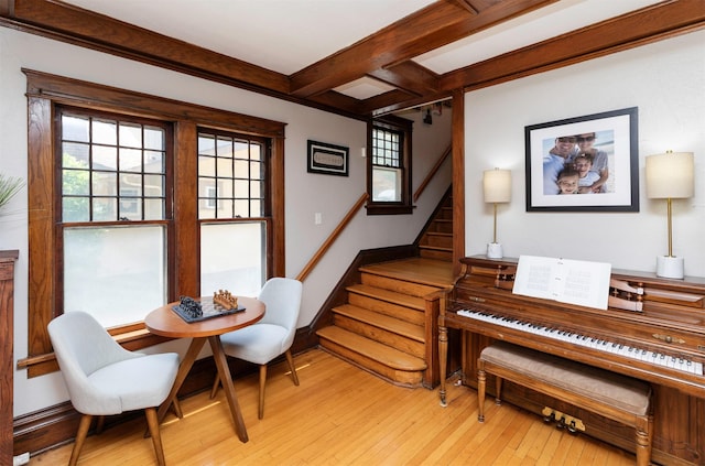 642 Polk Blvd, Des Moines, IA 50312 - sitting room with light wood-type flooring, beamed ceiling, and stairs