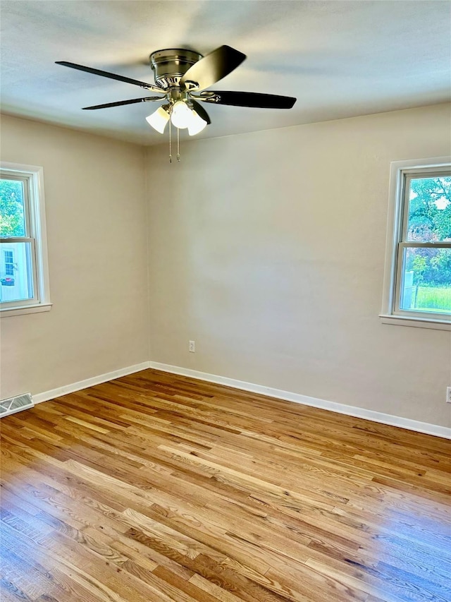 2327 Glenbrook Dr, Des Moines, IA 50316 - spare room with light wood finished floors and a ceiling fan