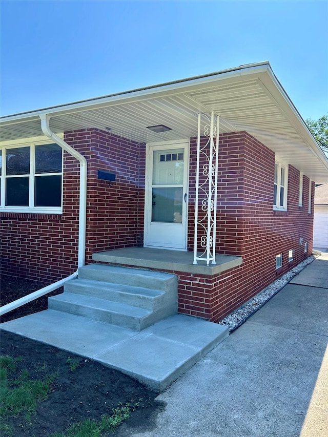 2327 Glenbrook Dr, Des Moines, IA 50316 - property entrance featuring brick siding