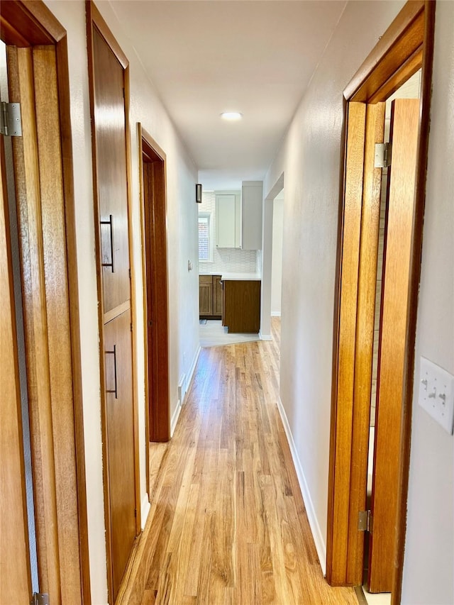 2327 Glenbrook Dr, Des Moines, IA 50316 - hallway featuring light wood-style floors and baseboards