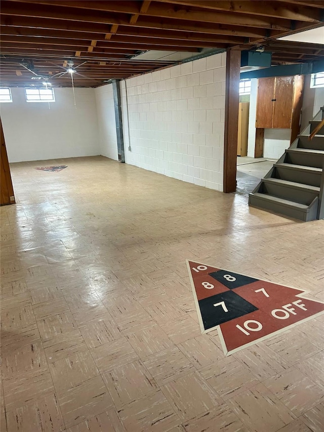 2327 Glenbrook Dr, Des Moines, IA 50316 - below grade area featuring stairway and light floors