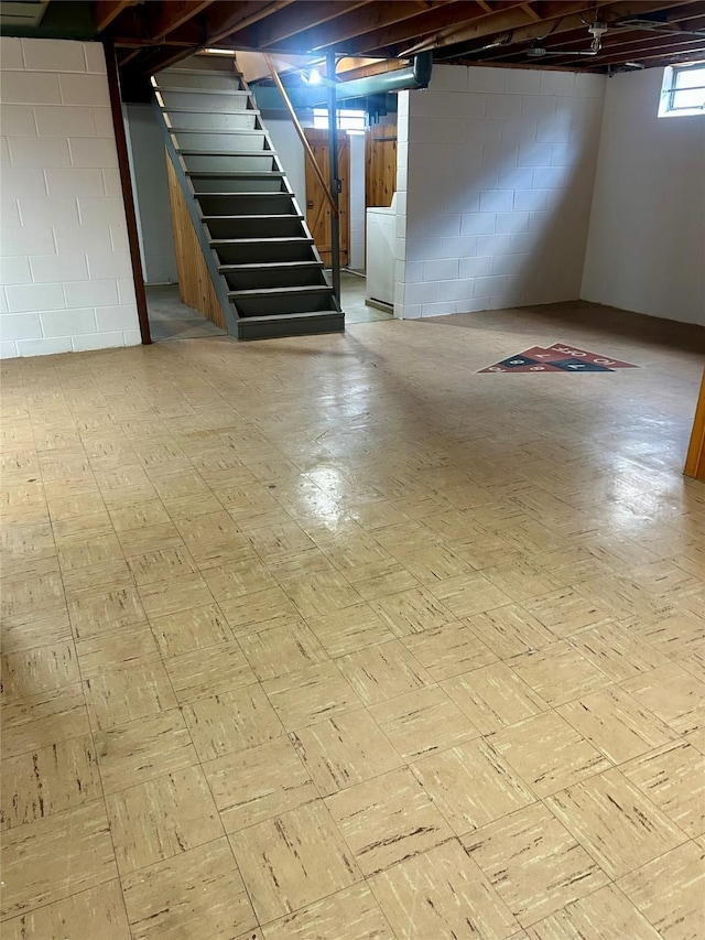 2327 Glenbrook Dr, Des Moines, IA 50316 - below grade area featuring stairway and washer / dryer