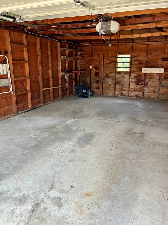 2327 Glenbrook Dr, Des Moines, IA 50316 - garage featuring a garage door opener