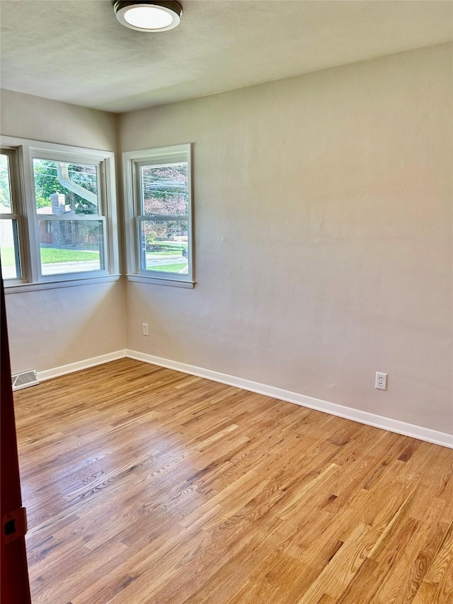 2327 Glenbrook Dr, Des Moines, IA 50316 - empty room with light wood finished floors