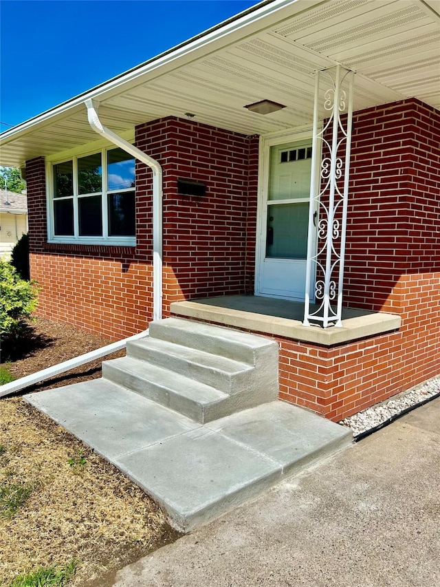 2327 Glenbrook Dr, Des Moines, IA 50316 - doorway to property featuring brick siding