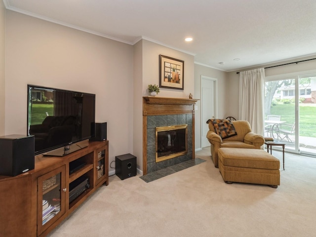 2906 Watrous Ave, Des Moines, IA 50321 - living room with carpet, crown molding, a tile fireplace, and recessed lighting