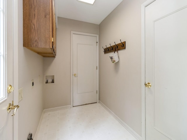 2906 Watrous Ave, Des Moines, IA 50321 - washroom with cabinet space, hookup for a washing machine, light floors, and hookup for an electric dryer