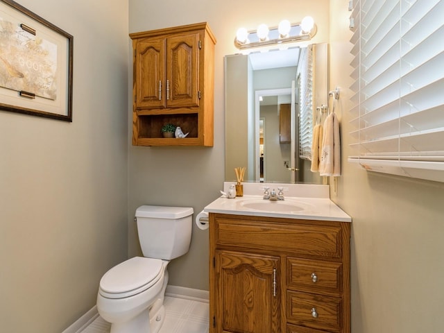 2906 Watrous Ave, Des Moines, IA 50321 - bathroom with vanity and toilet