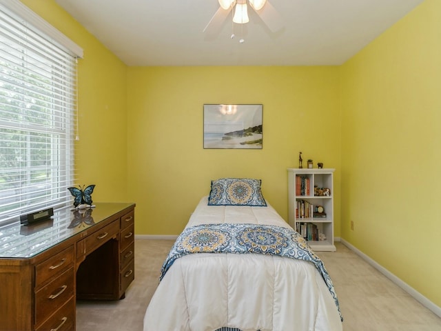 2906 Watrous Ave, Des Moines, IA 50321 - bedroom featuring light carpet and a ceiling fan