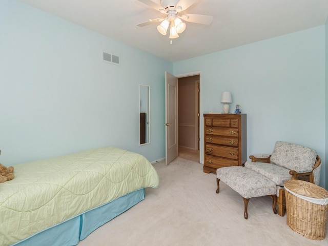 2906 Watrous Ave, Des Moines, IA 50321 - carpeted bedroom with ceiling fan and baseboards