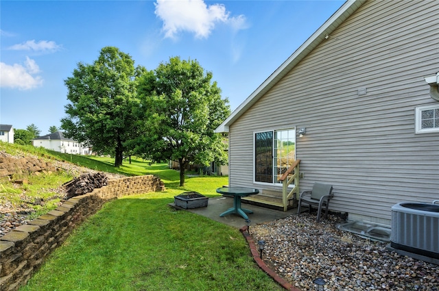 711 Kitterman Cir, Norwalk, IA 50211 - view of grassy yard featuring a patio area