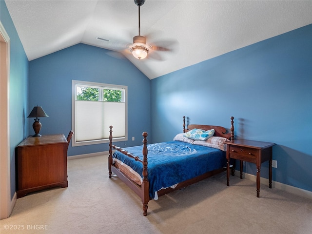 4710 76th St, Urbandale, IA 50322 - bedroom with vaulted ceiling, light carpet, and ceiling fan