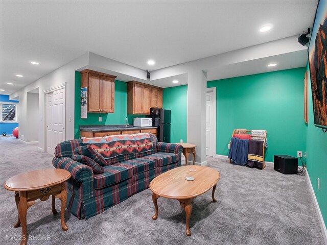 4710 76th St, Urbandale, IA 50322 - carpeted living room featuring recessed lighting