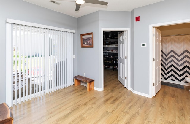 2323 E Porter Ave Unit 36, Des Moines, IA 50320 - spare room featuring wood finished floors and ceiling fan