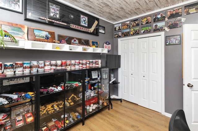 2323 E Porter Ave Unit 36, Des Moines, IA 50320 - bedroom with wood finished floors, a closet, and wood ceiling