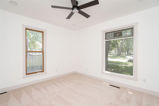600 S 3rd Ave W, Newton, IA 50208 - carpeted empty room with a ceiling fan and baseboards