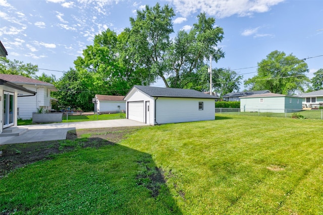 4132 E 24th Ct, Des Moines, IA 50317 - view of yard with an outbuilding and a detached garage
